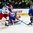 GRAND FORKS, NORTH DAKOTA - APRIL 19: Russia's Andrei Svechnikov #14 and Sweden's Jesper Sellgren #9 battle for the puck while Sweden's Filip Gustavsson #1  looks on during preliminary round action at the 2016 IIHF Ice Hockey U18 World Championship. (Photo by Matt Zambonin/HHOF-IIHF Images)


